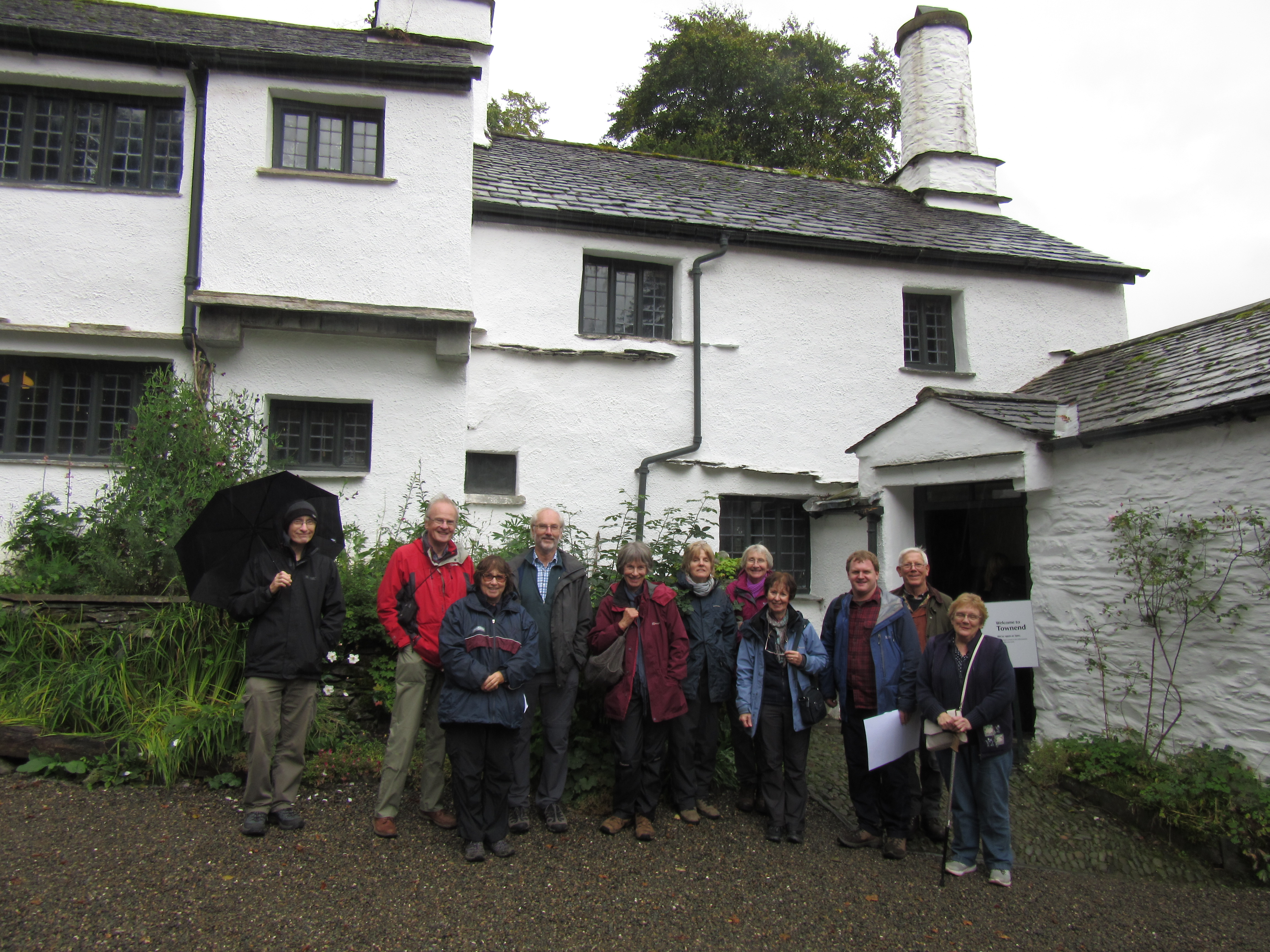 VCH Cumbria volunteers outside National Trust Townend, a traditional 17th century farmhouse and home of the Browne family, a wealthy yeoman dynasty.